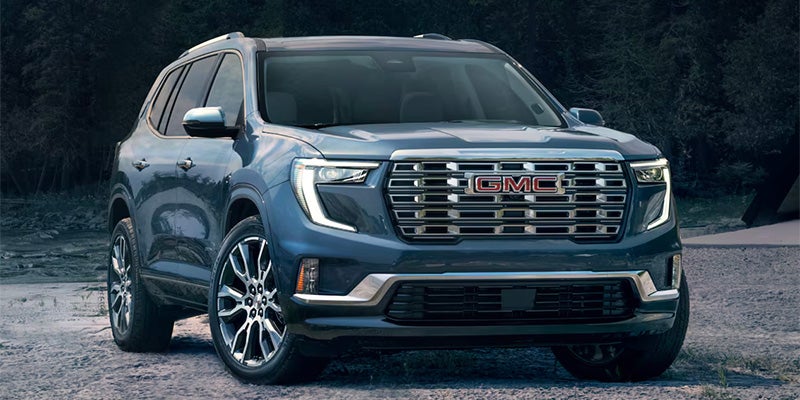 Front exterior view of a 2025 GMC Acadia SUV parked outdoors.