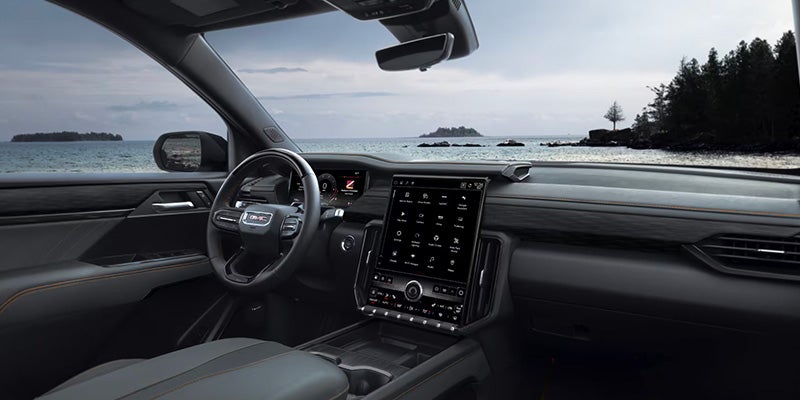Interior dashboard and infotainment display of the 2025 GMC Acadia.